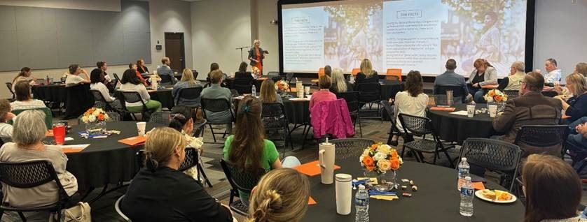 Picture of Dr AJ Griffin presenting